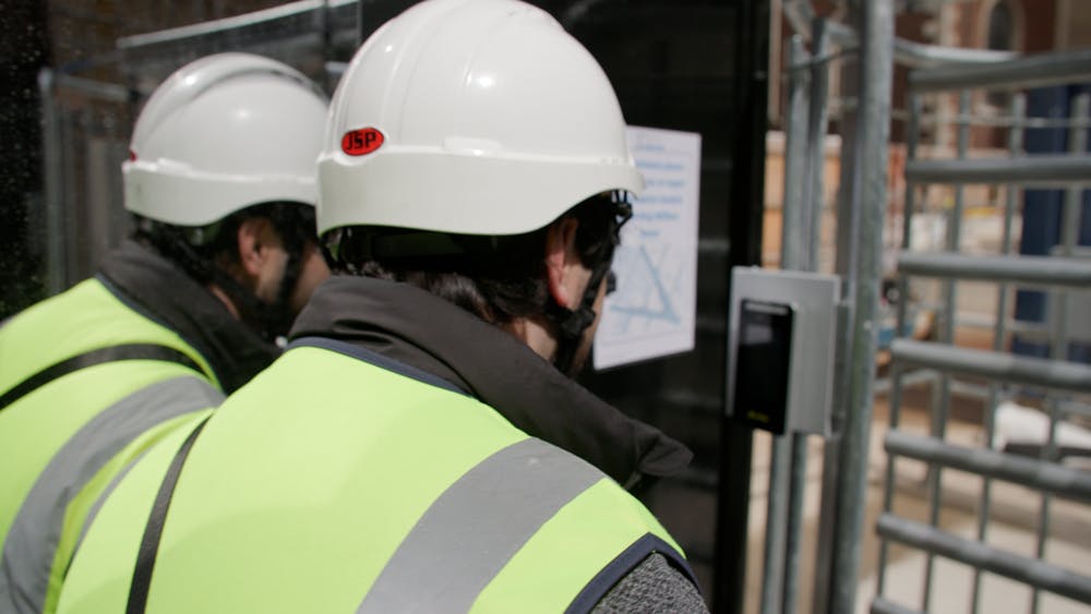 Site team entering a construction site using an access control system