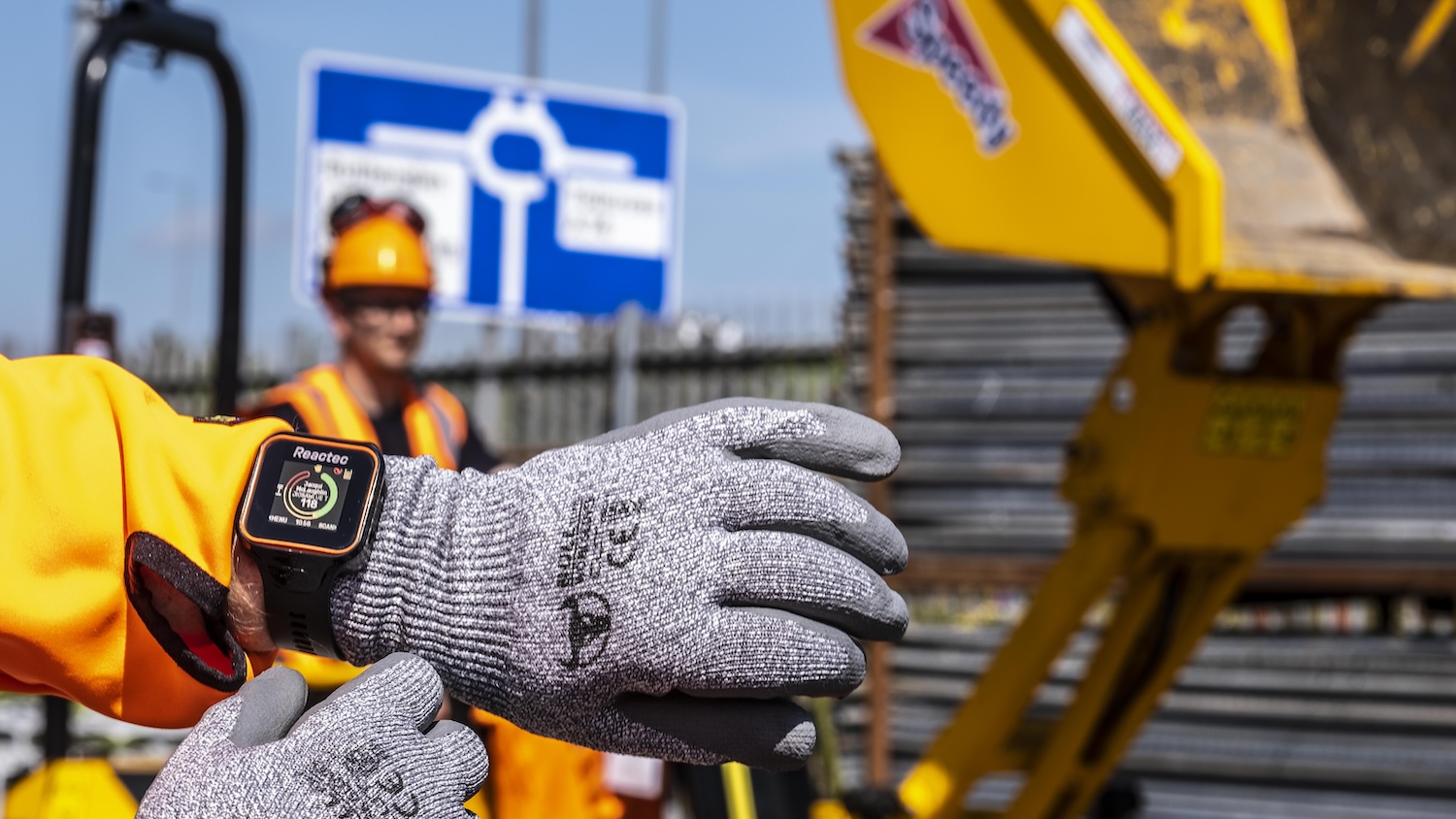 Image of a construction worker wearing the Reactec safety watch