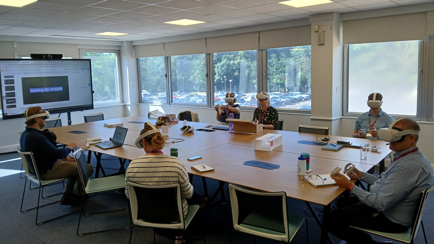 @one Alliance staff learning to use VR headsets